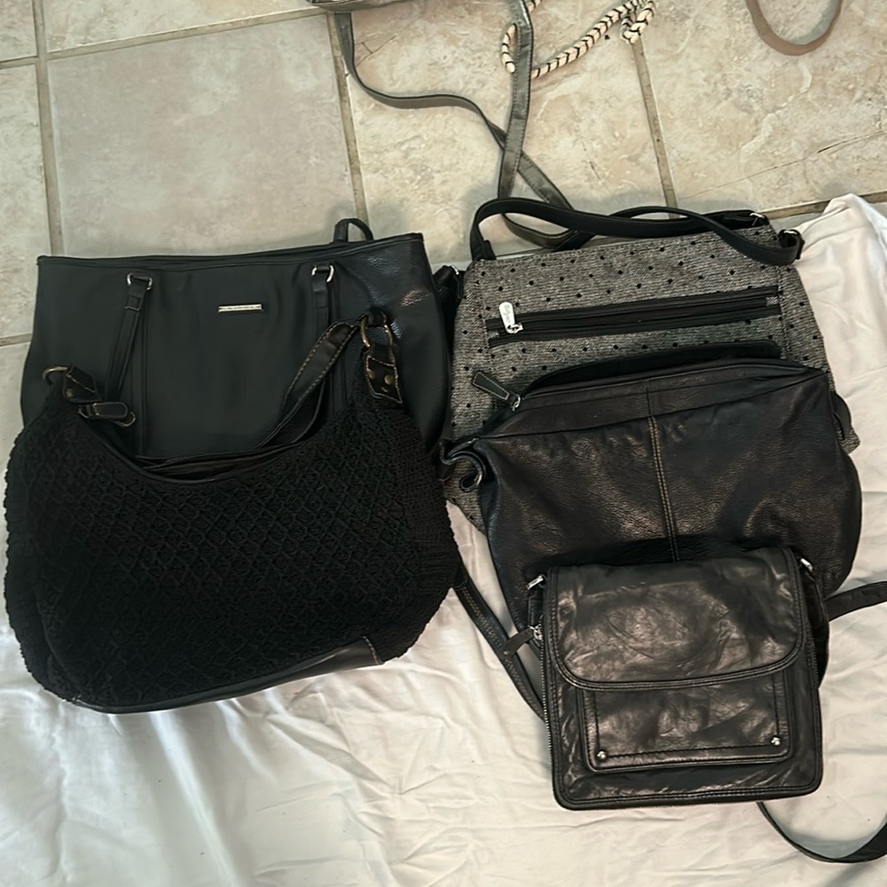 I  SOLD.  have five black purses from Dana Buchman she space HAAS Stone Mountain